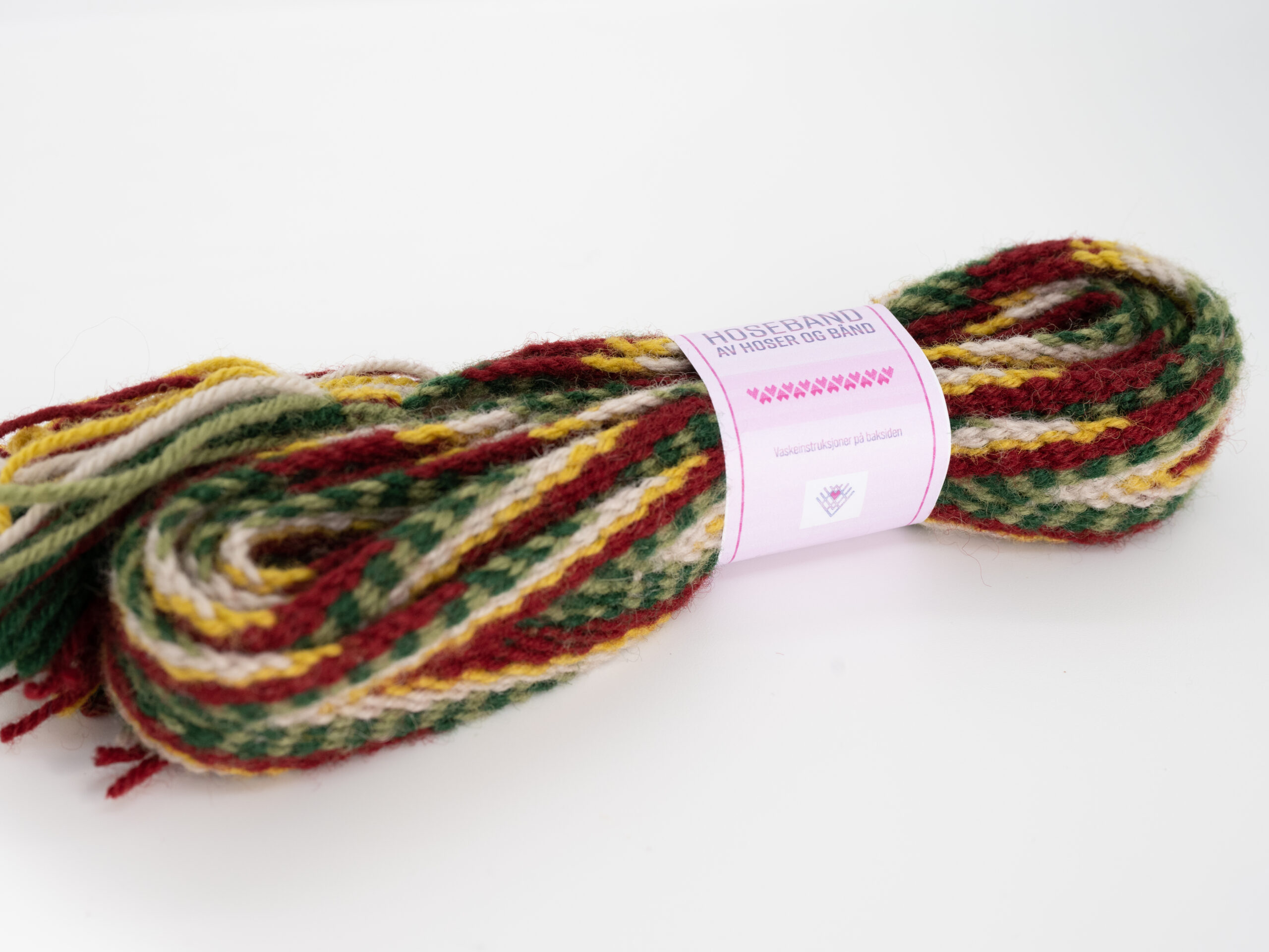 Sokkebånd til mannsbunad fra Gudbrandsdalen i farger som matcher vesten