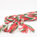 Sokkebånd til bunad fra Nord-Hordland i fargene rødt, grønt og hvitt